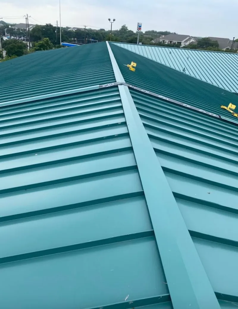 Green commercial metal roof ridge and valley for Metal Roof Repair in Solana Beach